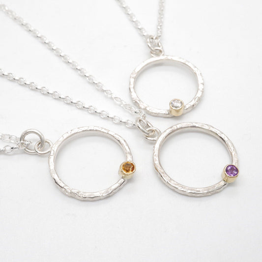 Birthstone hammered circle pendants. - Gretna Green Wedding Rings