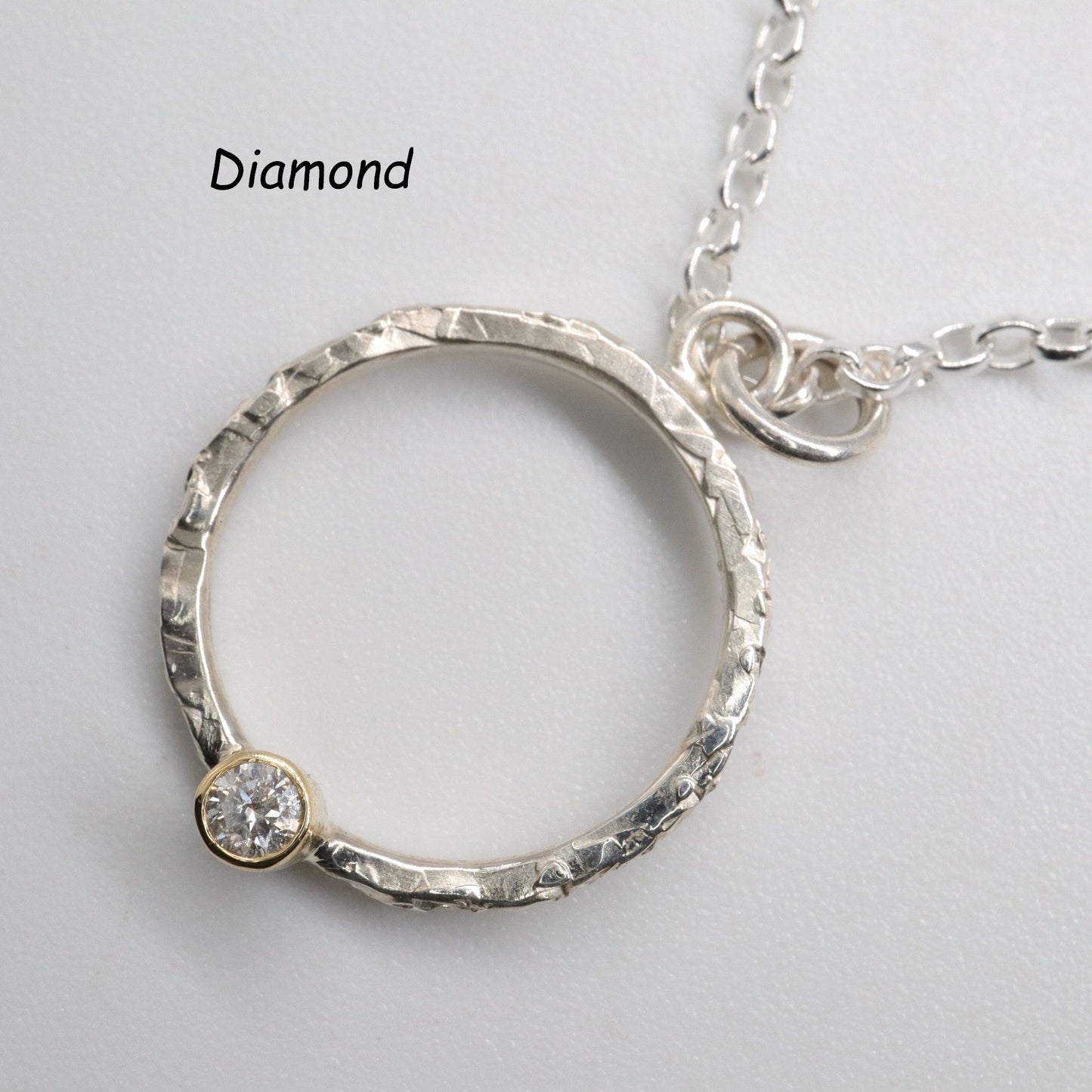 Birthstone hammered circle pendants. - Gretna Green Wedding Rings